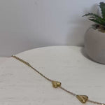 Load and play video in Gallery viewer, Triple Heart Charm Bracelet – 18K Gold Plated